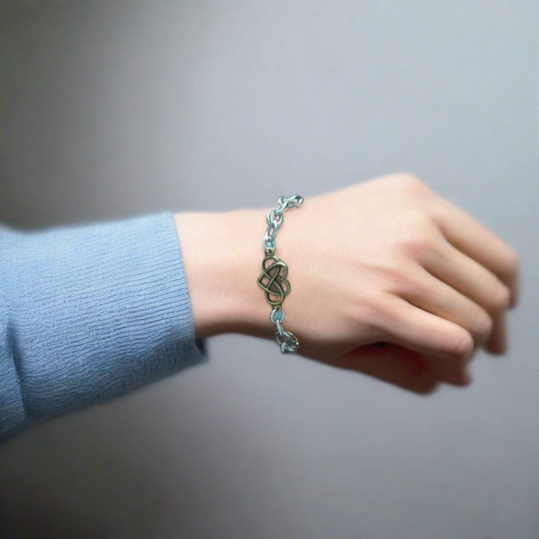 Bracelet - 7 inches silver curb chain with bronze pendant and round magnetic clasp