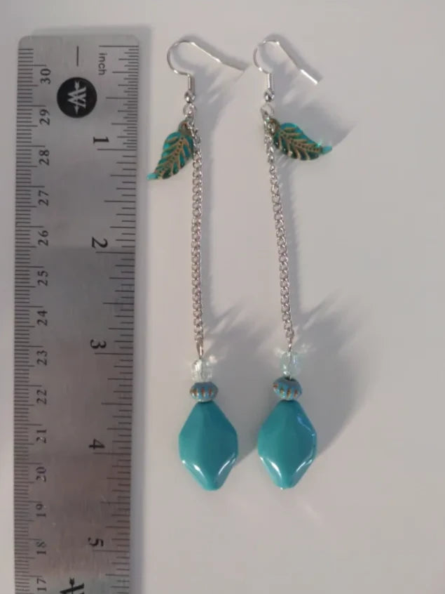 Earrings - Blue Leaf Charm, One Large Smooth Blue Bead, One Small Blue Textured Bead, One Small Clear Textured Bead, on Silver Chain Hook