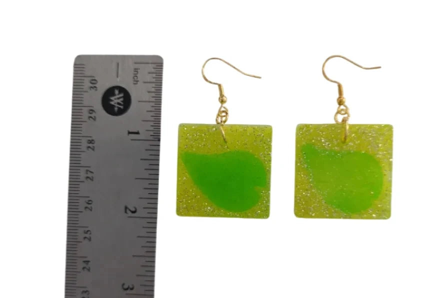 Earrings - Resin medium yellow glitter square with green leaf on gold hook