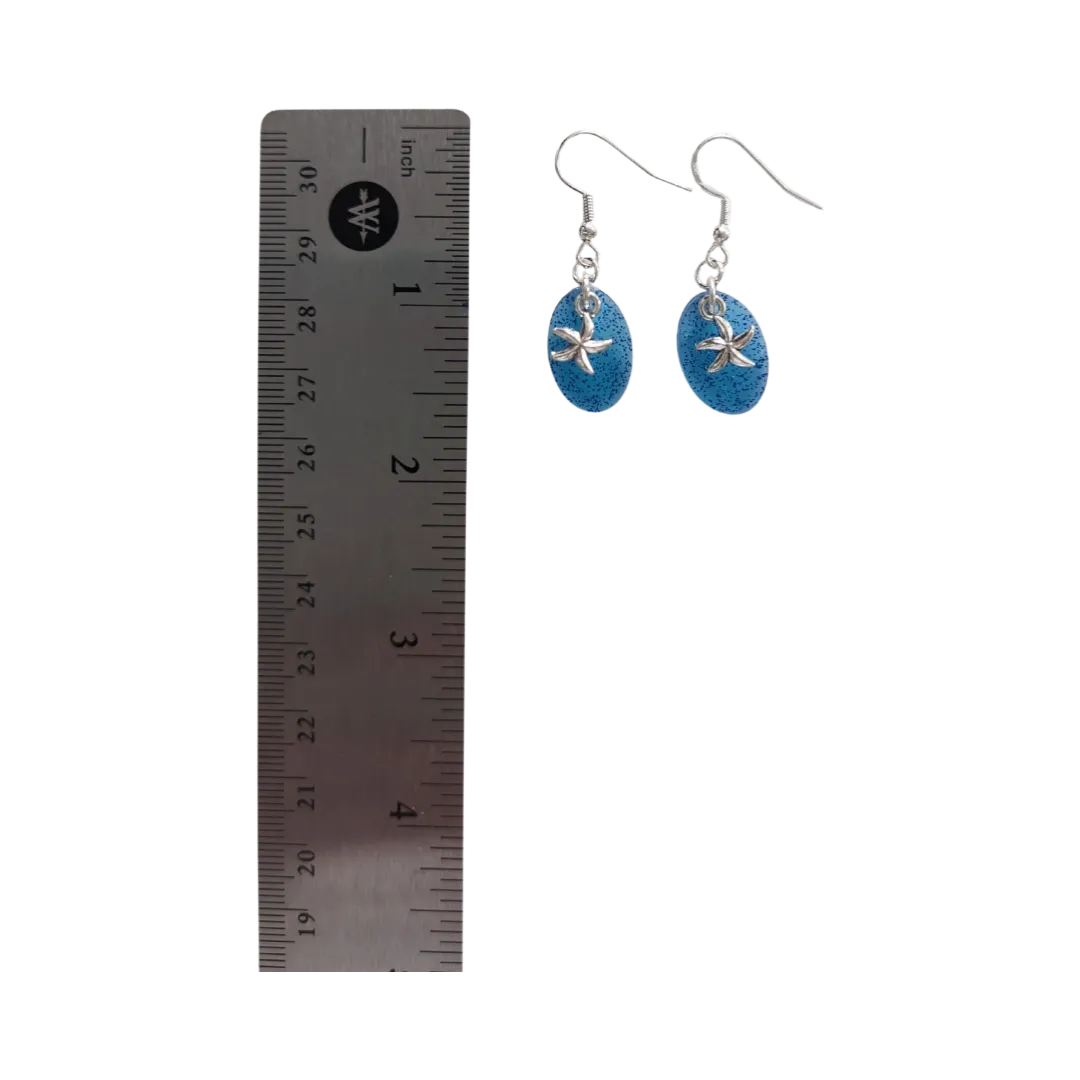 Earrings - Resin small blue glitter oval with silver starfish on hook