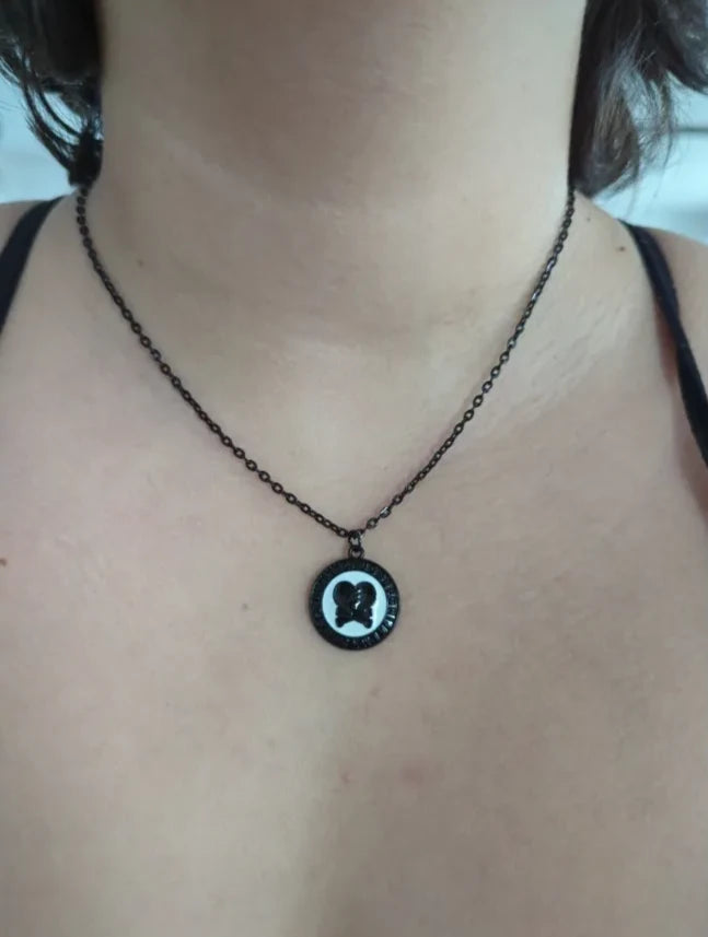 Necklace - 16.5 inches broken heart charm on black chain