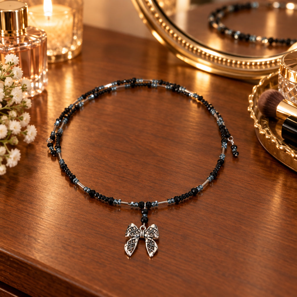 Black Crystal & Silver Tube Bead Memory Wire Choker – Textured Bow Charm