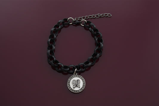 Bracelet - 7 inches Broken heart charm on black rolo chain