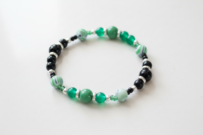 Bracelet - Elastic 6mm and 8mm black & green glass beads and 8mm acrylic green & black ink pattern beads and black & green seed beads and silver spacer beads