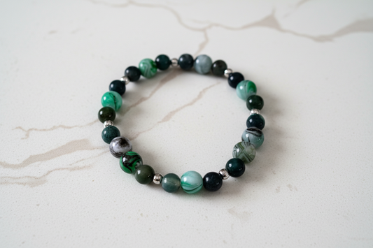 Bracelet - Elastic 6mm natural moss agate with 8mm acrylic black & green ink pattern beads and silver spacer beads