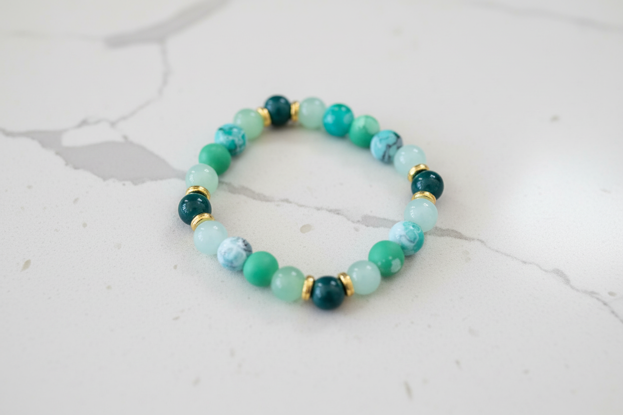 Bracelet - Elastic 8mm green & green patterned glass beads gold spacer beads