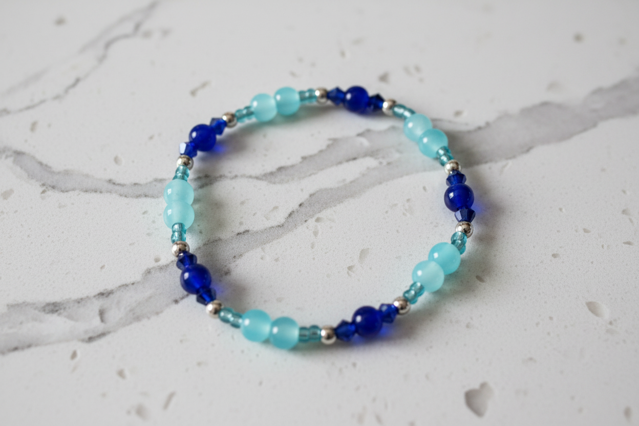 Bracelet - Elastic Blue 6mm glass beads with 4mm bicone beads and seed beads and silver beads