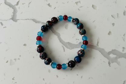 Bracelet - Elastic  blue, red and brown tones 8mm & 6 mm glass beads with silver spacers