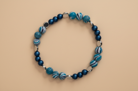 Bracelet - Large 8 inches Elastic blue 8mm & 6 mm beads with silver spacer beads
