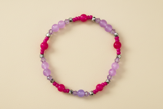 Bracelet - Medium 7.5 inches Elastic hot pink & light pink 6mm glass beads and 4mm bicone beads and seed beads with silver spacer beads