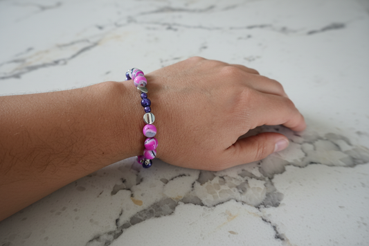 Bracelet - Medium 7.5 inches Elastic purple 8mm, 6mm, & 4mm beads with silver spacer beads