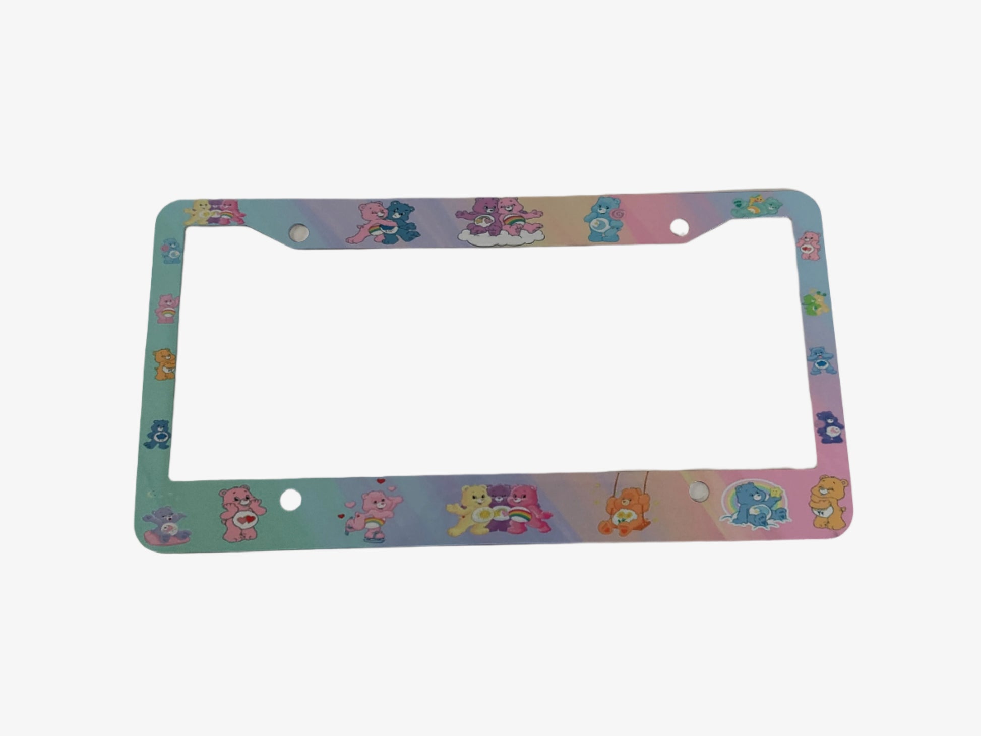 Add some fun and personality to your car with our License Plate Frame featuring the beloved Care Bears. Made of lightweight metal aluminum, it provides lasting protection against rust and aging. Easy to install and suitable for all US and Canadian license plates. Weighs only 2 oz and measures 12.2x6.3x0.04 inches.