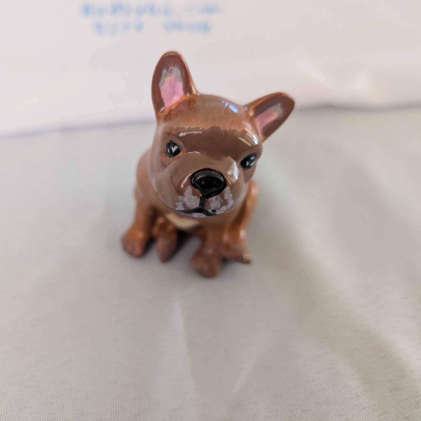 Resin frenchie dog trinket

hand crafted with eco resin, and hand painted with acrylic paints.

Eco Resin feels similar to Ceramic or porcelain: smooth, cool to the touch, and non-plastic.