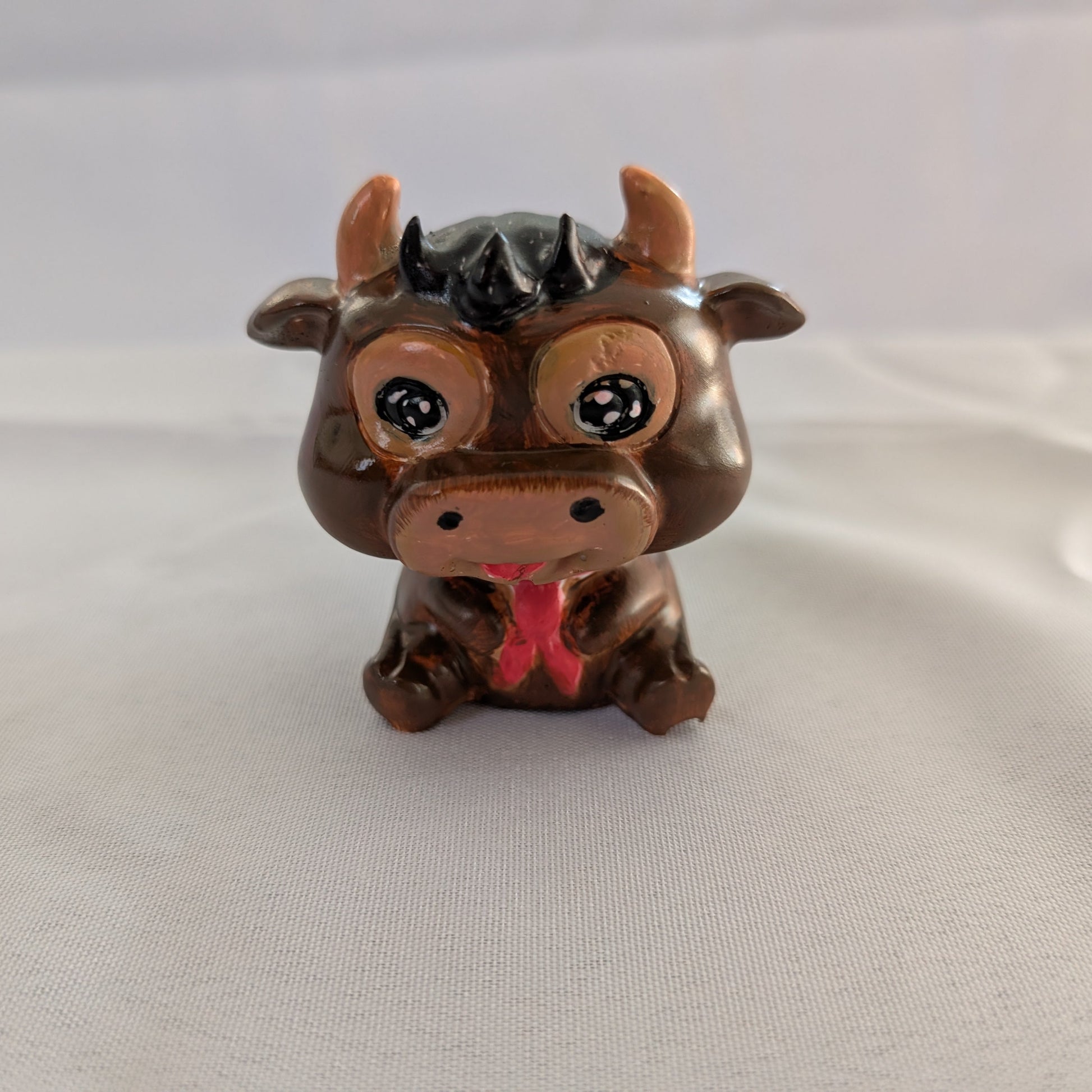 Resin Cow trinket

hand crafted with eco resin, and hand painted with acrylic paints.

Eco Resin feels similar to Ceramic or porcelain: smooth, cool to the touch, and non-plastic.