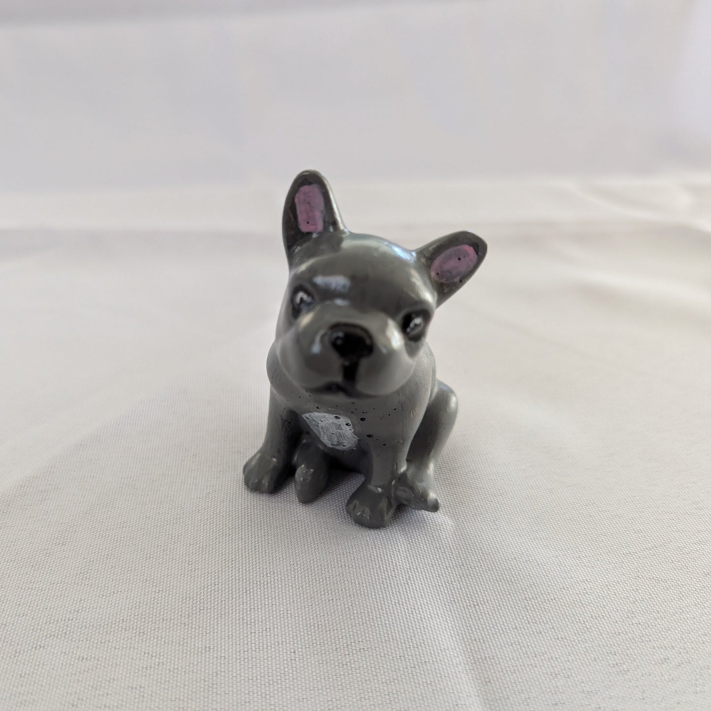 Resin frenchie dog trinket

hand crafted with eco resin, and hand painted with acrylic paints.

Eco Resin feels similar to Ceramic or porcelain: smooth, cool to the touch, and non-plastic.