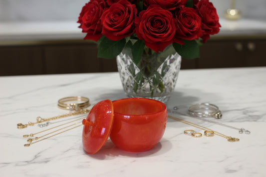 hand crafted with epoxy resin..

Epoxy resin is typically smooth, rigid, and non-porous, similar to a hard plastic or glass.

Knickknack - Resin apple trinket with lid