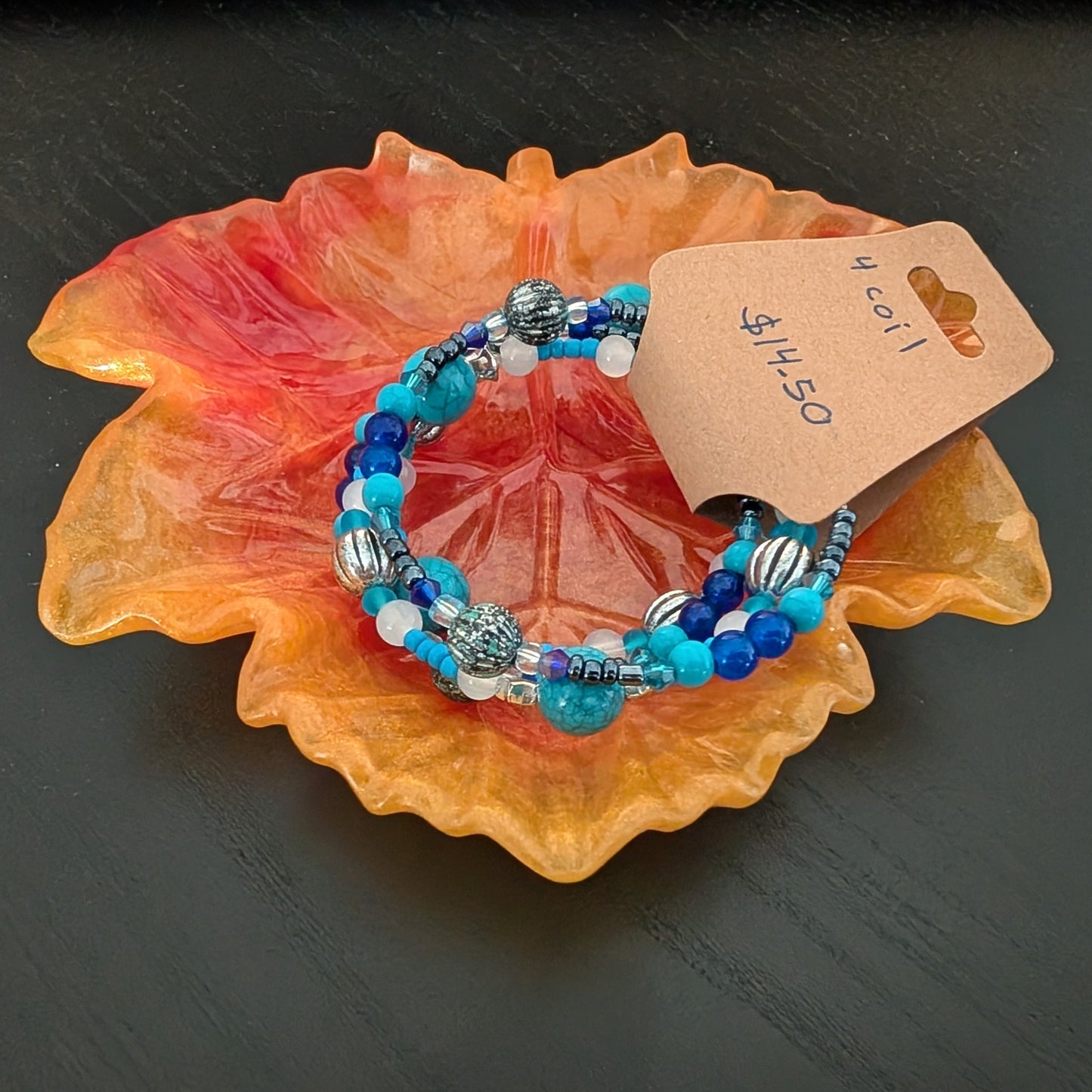 Elevate your space with the Knickknack Resin Maple Leaf Trinket Tray. Crafted with care, its vibrant maple leaf design adds a touch of nature-inspired charm while keeping your small essentials organized. Perfect for keys, jewelry, or coins, this tray combines functionality with seasonal style, making it a must-have accent for any room.