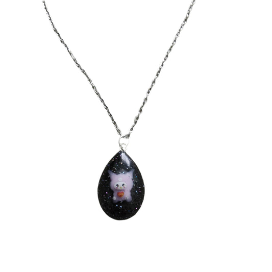This stunning necklace features a 16.5 inch stainless steel link cable chain with a charming resin Kuromi character pendant. Crafted with quality materials, this necklace is both durable and stylish. Upgrade your accessory game with this unique and eye-catching piece.