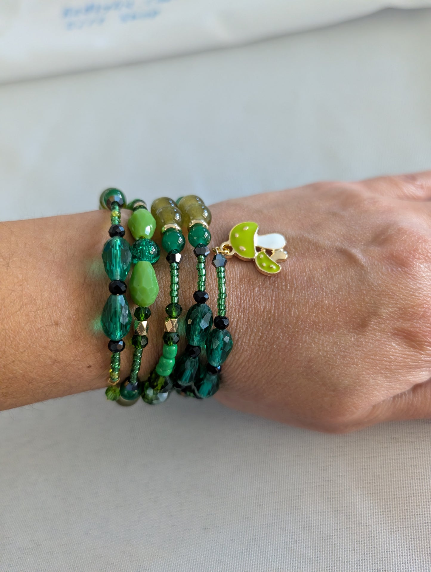 4 coil Boho Green Wrap Bracelet with mushroom charm