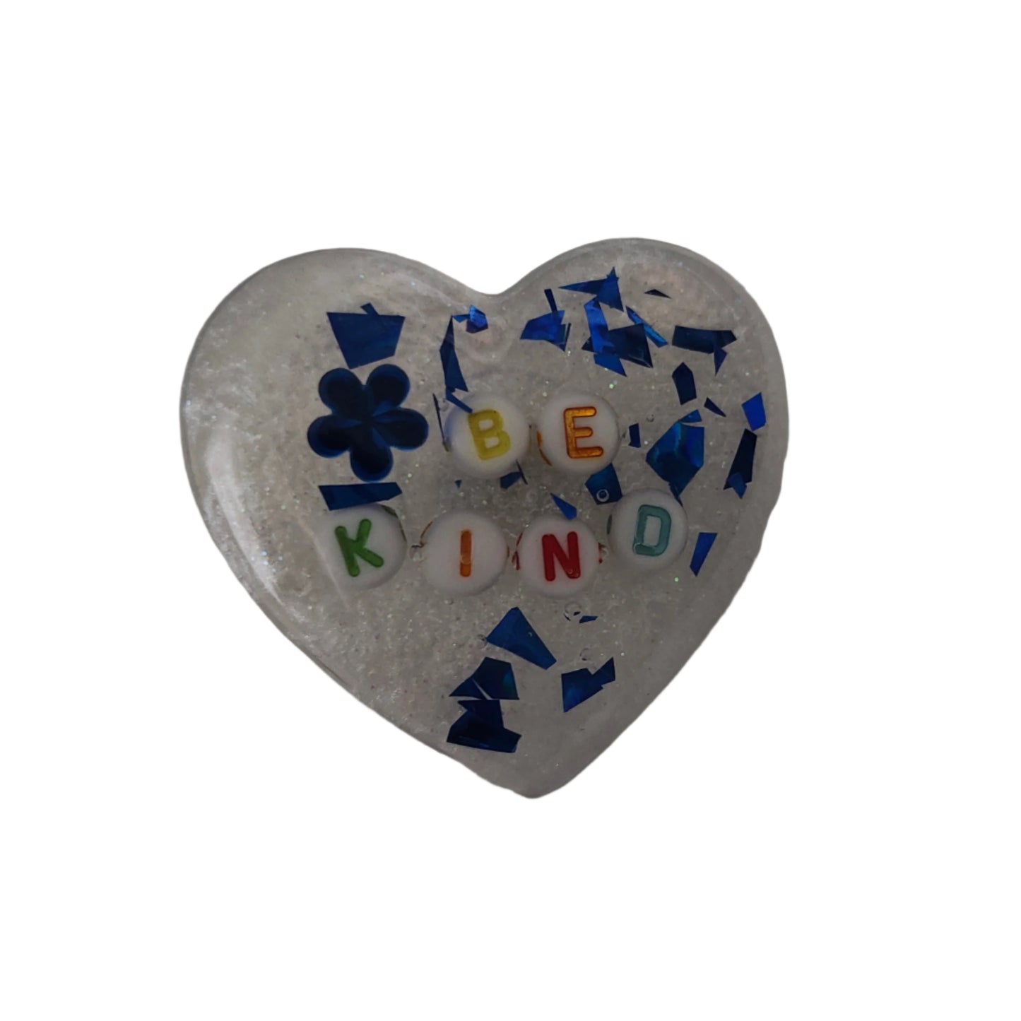 Wear your heart on your sleeve (or anywhere!) with this playful 3D resin heart pin. The silver butterfly clutch adds a touch of whimsy to this lightweight 0.40 oz accessory, measuring 1.75 x 2 in. Show your love with a pinch of quirkiness.