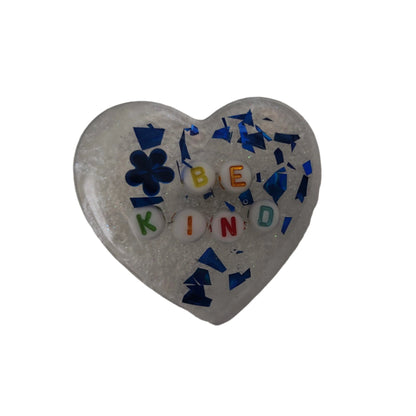 Wear your heart on your sleeve (or anywhere!) with this playful 3D resin heart pin. The silver butterfly clutch adds a touch of whimsy to this lightweight 0.40 oz accessory, measuring 1.75 x 2 in. Show your love with a pinch of quirkiness.