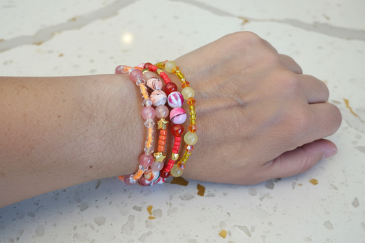 Bracelet - 4 coil & 6 coil Memory wire bracelet red orange & yellow beads with gold spacer beads