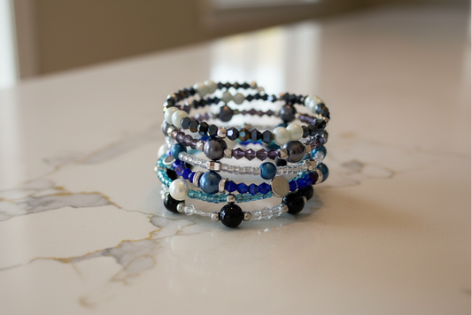 Bracelet - 6 coil black, blue & silver glass beads with  white, blue & silver pearl beads and clear, purple, black & blue bicone beads and clear & blue glass seed beads with silver spacer beads memory wire bracelet