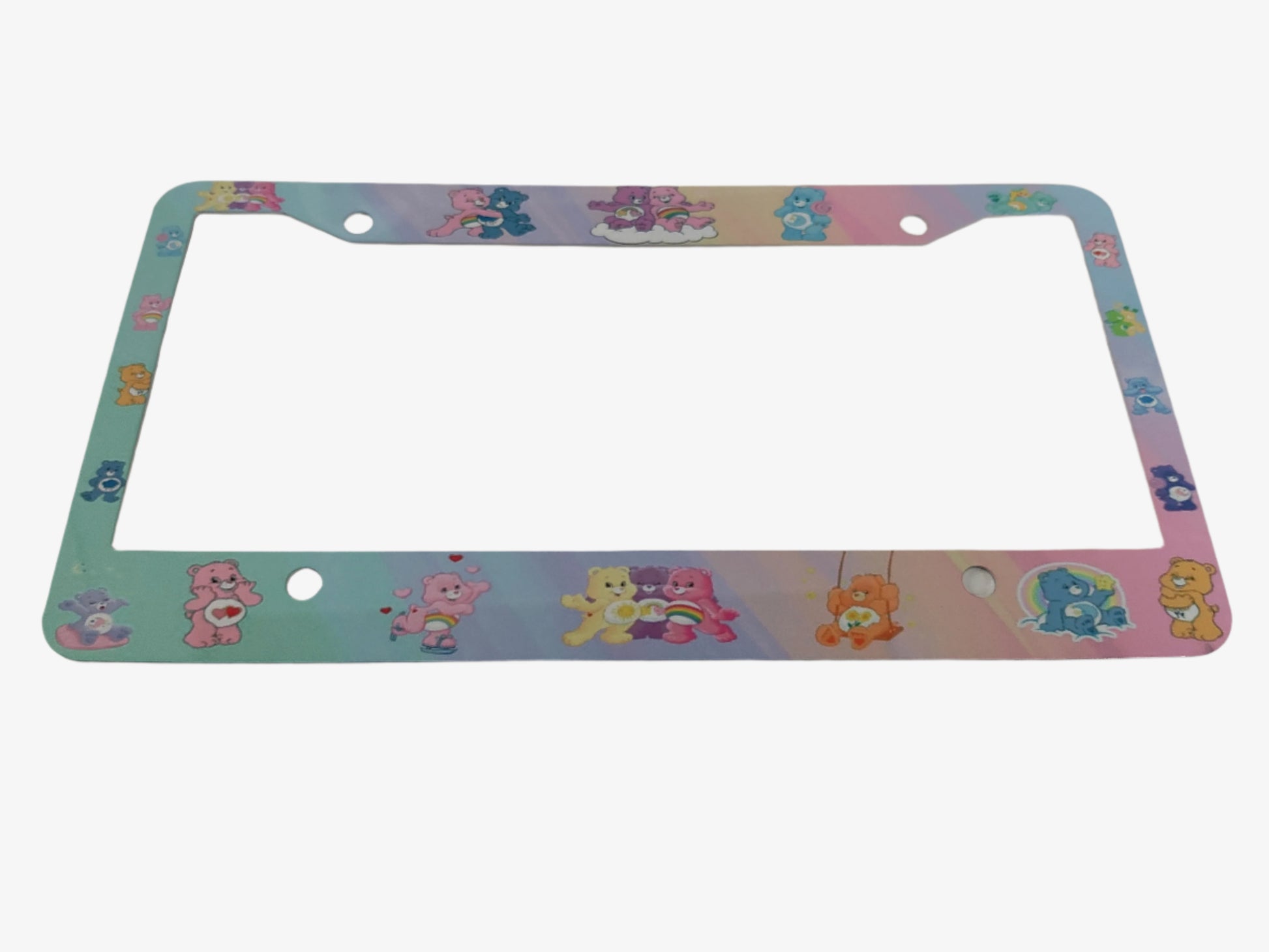 Add some fun and personality to your car with our License Plate Frame featuring the beloved Care Bears. Made of lightweight metal aluminum, it provides lasting protection against rust and aging. Easy to install and suitable for all US and Canadian license plates. Weighs only 2 oz and measures 12.2x6.3x0.04 inches.