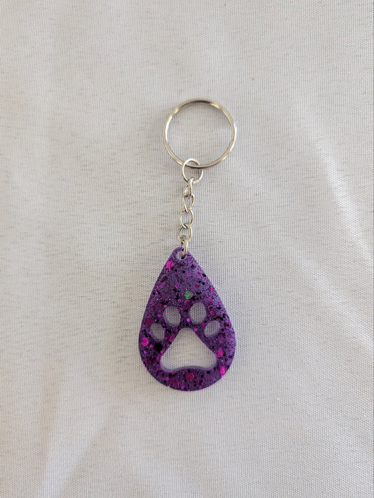 Handmade_Keychain_-_Purple_Resin_paw_teardrop_by_Radly4u