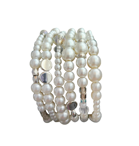 Experience elegance with our Memory Wire Bracelet featuring white pearl beads and silver spacer beads. Enhance any outfit with this versatile and stylish piece. Feel confident and glamorous with every wear!