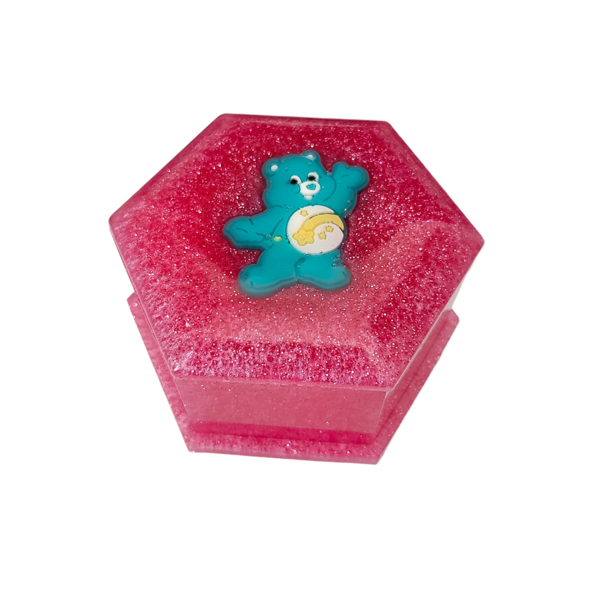 Add a touch of whimsy to your jewelry collection with our Knickknack Resin Hexagon Jewelry Box. The character lid adds a playful element to your storage, while the resin material ensures durability and protection for your precious pieces. Keep your jewelry safe and organized with this unique and charming box.