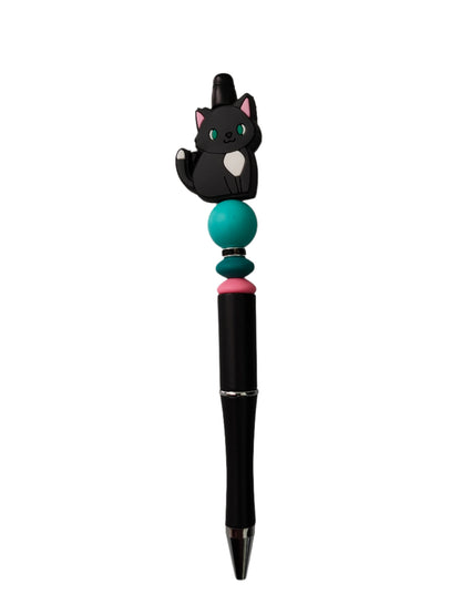 Get your paws on this adorable Pen - Cat silicon beaded acrylic pen! With sleek black ink, this pen is perfect for all your writing needs. The unique cat design is sure to make a statement and bring a smile to your face every time you use it. Upgrade your writing game today!