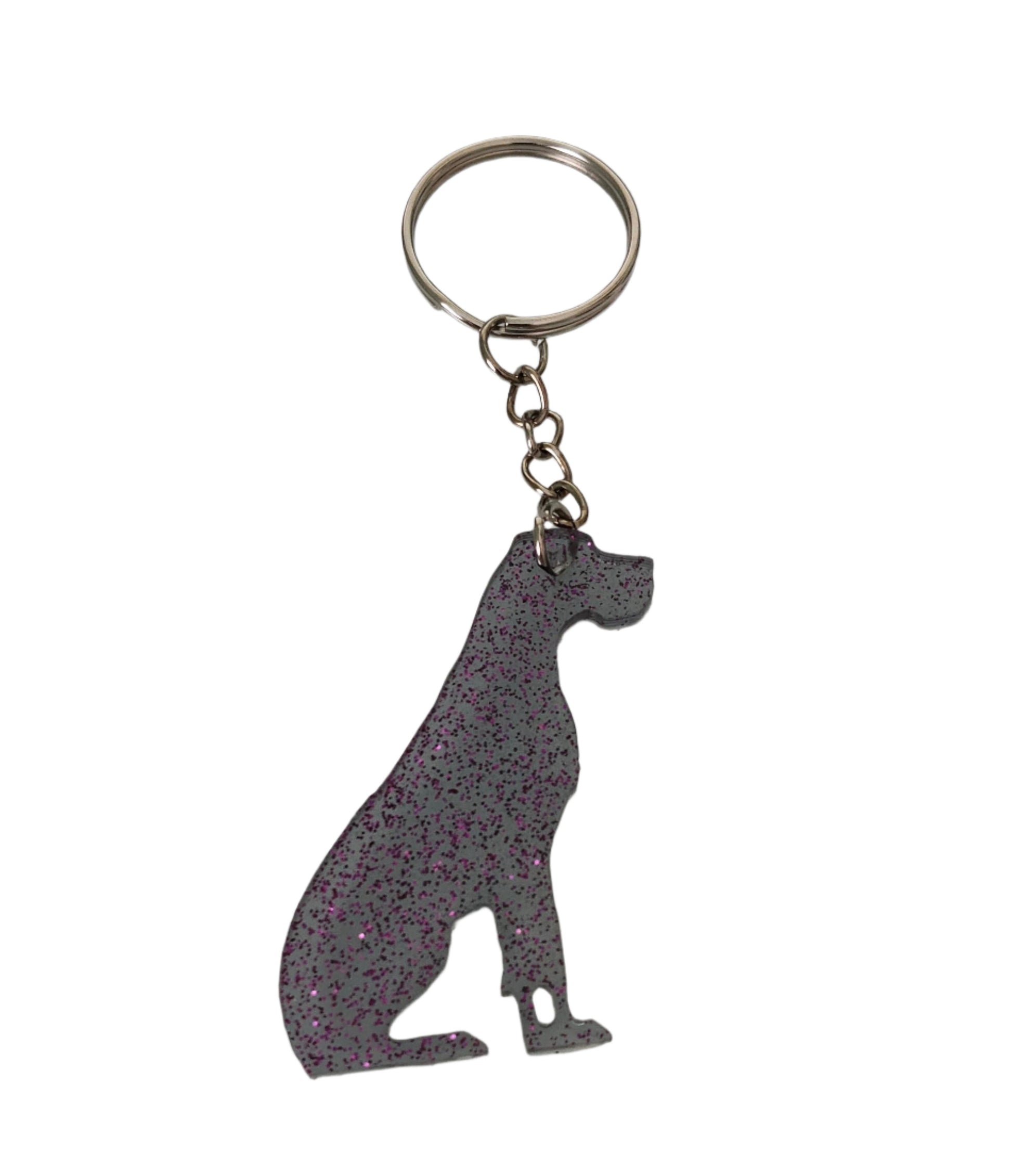 Keep your furry friend close at all times with our Keychain - Resin Dog! Made of durable resin, this keychain is both functional and stylish. Show off your love for your pup while keeping track of your keys. The perfect gift for any dog lover!
