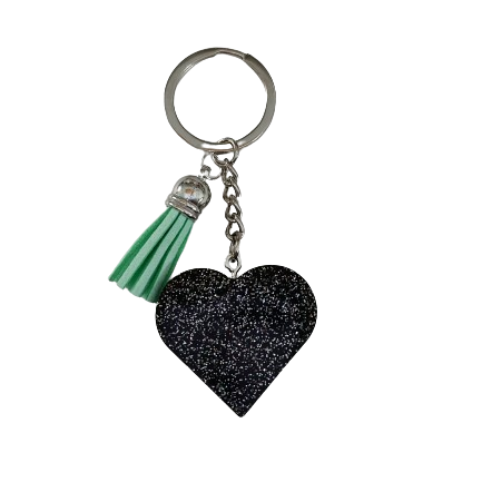 Show your heart is in the right place with this one-of-a-kind keychain! Its resin heart design is as unique as it is eye-catching – no two are alike. Plus, it's lightweight, making it perfect for carrying everywhere you go. Get your keychain on!