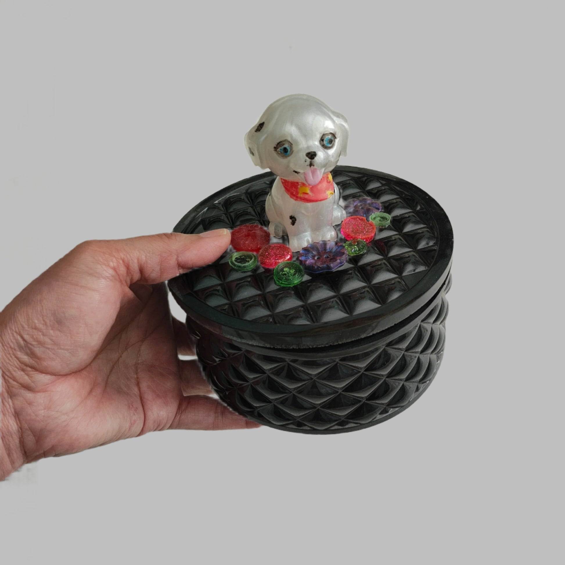 Keep your precious trinkets safe in this quirky Knickknack box! The resin round box features a playful dalmatian lid, adding a touch of fun to your storage. With a height of 5 inches and a dish depth of 2 inches, it's perfect for keeping your jewelry and small items organized. Weighing only 11 ounces, it's lightweight and easy to move around. 