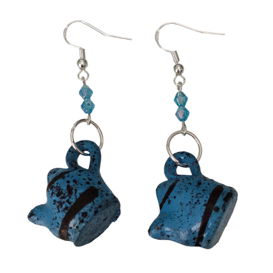 Add a playful and quirky touch to your jewelry collection with our Ceramic Kettle Earrings! These unique earrings feature colorful beads on a silver hook, adding a touch of whimsy to any outfit. Measuring at 2.25 inches in length and weighing just 0.19 ounces, they're the perfect statement piece for any occasion.