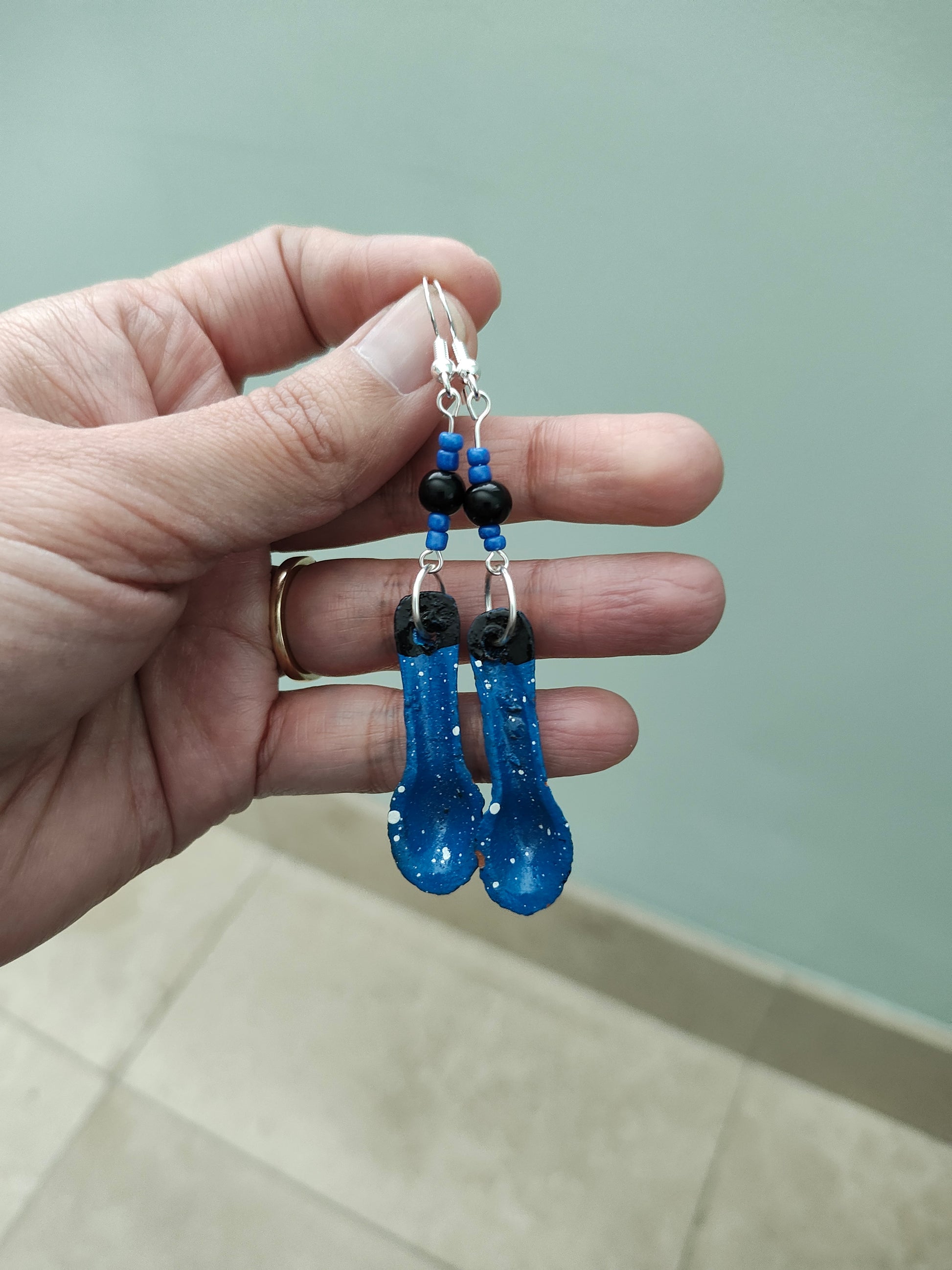 Add a quirky touch to your look with these ceramic spoon earrings! Adorned with colorful beads and dangling from a silver hook, the 3-inch length and lightweight design make them both stylish and comfortable. Perfect for adding a playful touch to any outfit!