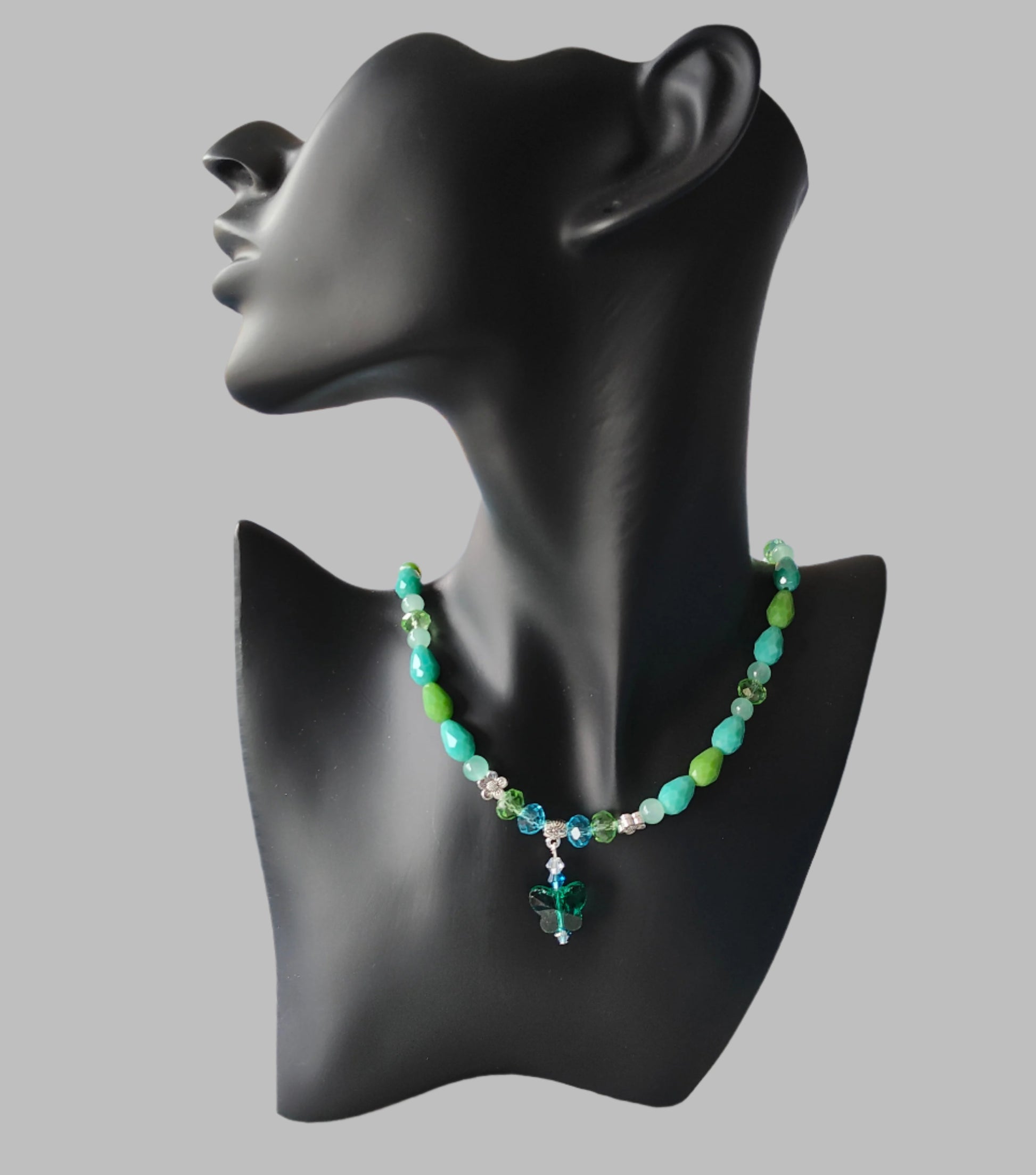 Flutter into style with our 19.5 inch crystal butterfly necklace, adorned with glass and metal flower beads. Lightweight at just 1.1oz, this piece is perfect for all-day wear. Includes 2 inch extension chain for the perfect fit. (Get ready to spread your wings!)

Necklace - 19.5 inches with crystal butterfly and glass beads and metal flower beads

Necklace length is approximately 19.5 inches not including 2 in extension chain