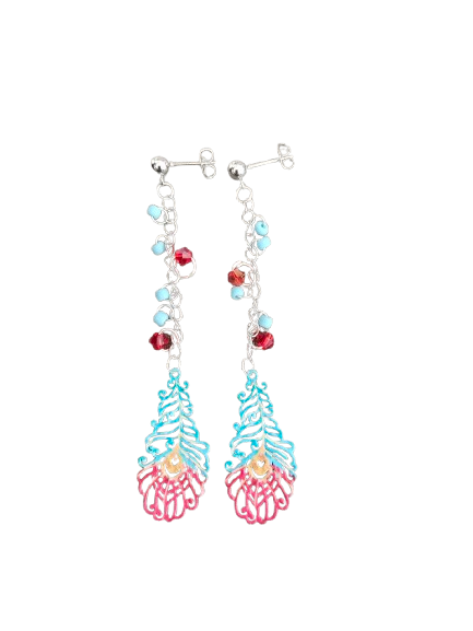 Inspire with our Filigree feather earrings. Made with stainless steel chains and delicate seed beads, these earrings feature intricate filigree feathers on ball post studs. Lightweight and elegant, perfect for any occasion. Elevate your style now!