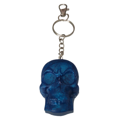 Add a touch of edginess to your keys with our unique Keychain featuring a resin skull face. Perfect for those who love to stand out and make a statement, this keychain is both functional and stylish. Never lose your keys and showcase your unique style with our Keychain - Resin skull face!