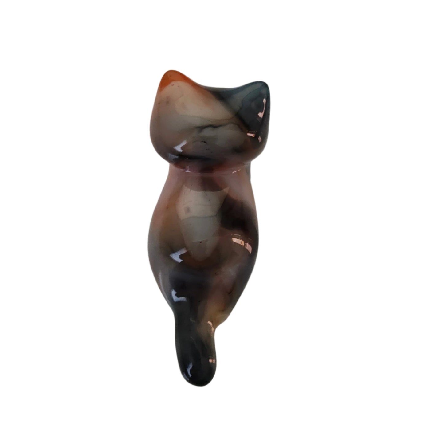 This adorable calico cat trinket is handcrafted from epoxy resin, giving it a smooth, glass-like finish that's both durable and delightfully tactile. Perfect for desk displays, shelf styling, or as a quirky gift for cat lovers, this petite feline measures just 1 x 2.75 inches and weighs a feather-light 0.96 oz. Each piece showcases the artisan charm of handmade resin work, making it a one-of-a-kind accent that brings personality to any space.