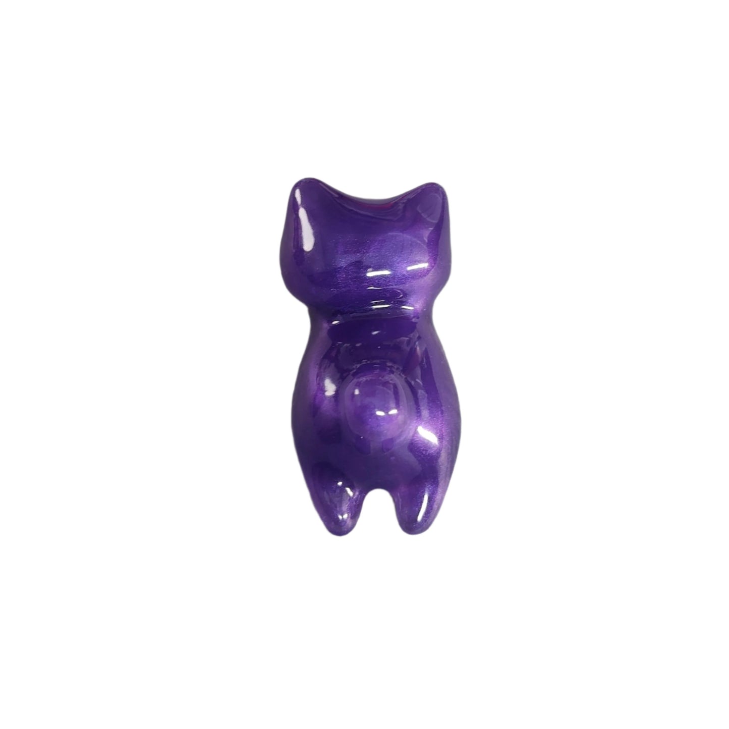 This charming Knickknack features a small purple cat made of resin. Perfect for holding trinkets and adding a touch of feline grace to your home decor!