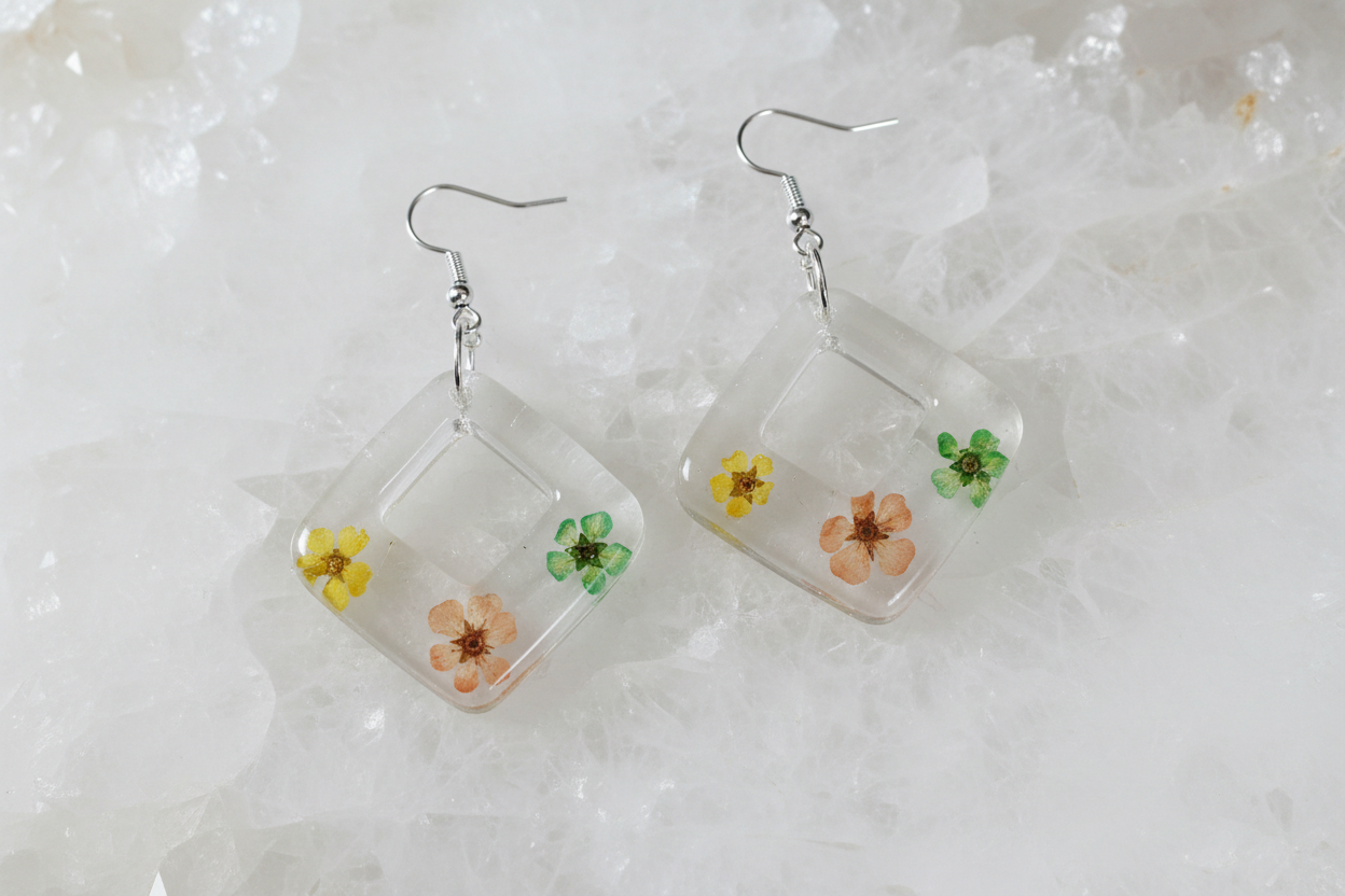 clear resin with dried flowers earrings on a sterling silver hook