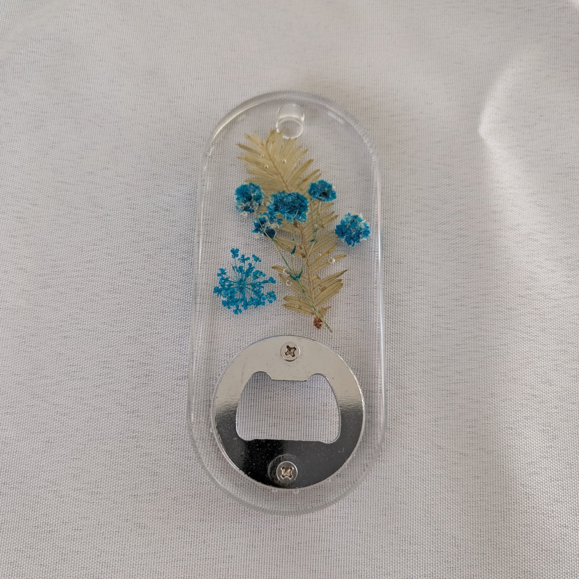 ntroducing Knickknack - the perfect resin bottle opener with an oval shape design. Effortlessly open your favorite brews with a touch of style and functionality. Say goodbye to struggling with other openers and hello to a unique and efficient tool. Cheers to a great time with Knickknack!

Knickknack - Resin oval shape bottle opener