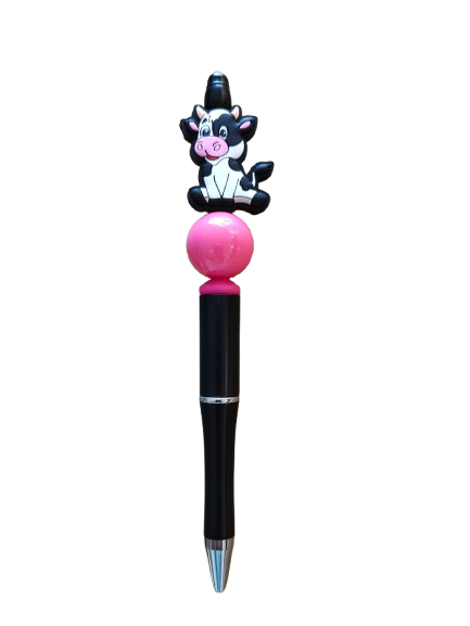 Add a fun twist to your writing with our Cow silicon beaded acrylic pen! The black ink flows smoothly, while the beaded design provides a comfortable grip. Experience the satisfaction of writing with this unique and stylish pen.
