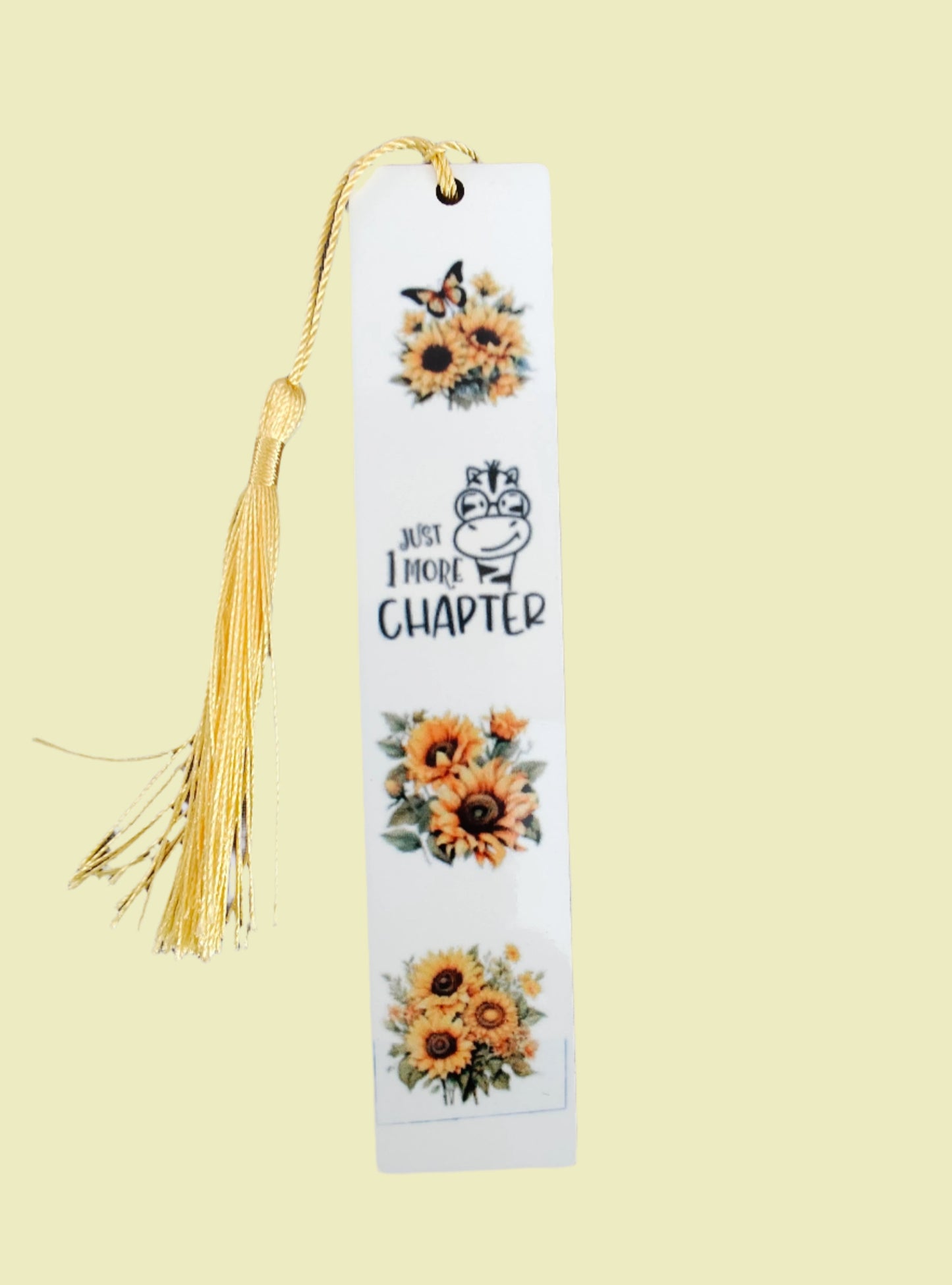 Never lose your place again with our beautiful double sided tassel bookmark! Featuring a vibrant sunflower design and the inspiring phrase "Just 1 more chapter", this bookmark will keep you motivated to keep reading. Say goodbye to bent pages and hello to organized reading!

Tassel color will vary

Long bookmark length 1 x 5.5 in

Short bookmark length 1 x 3.7 in