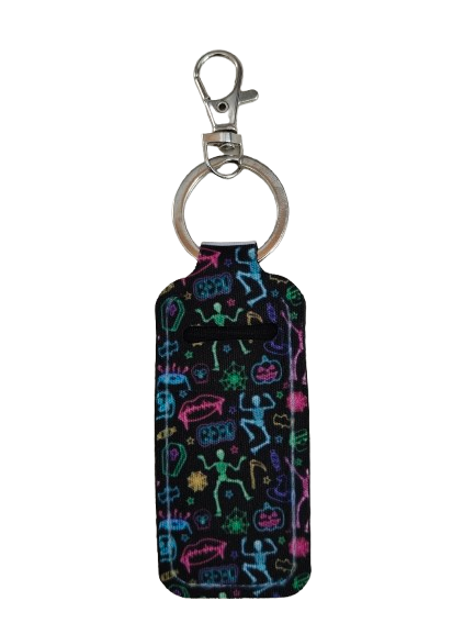 Store your favorite lipstick on the go with our sublimated lipstick holder keychain! Featuring a stylish skeleton design, this holder adds a touch of personality to your everyday essentials. Keep your lips perfectly polished and never lose your lipstick again with this convenient and eye-catching keychain!