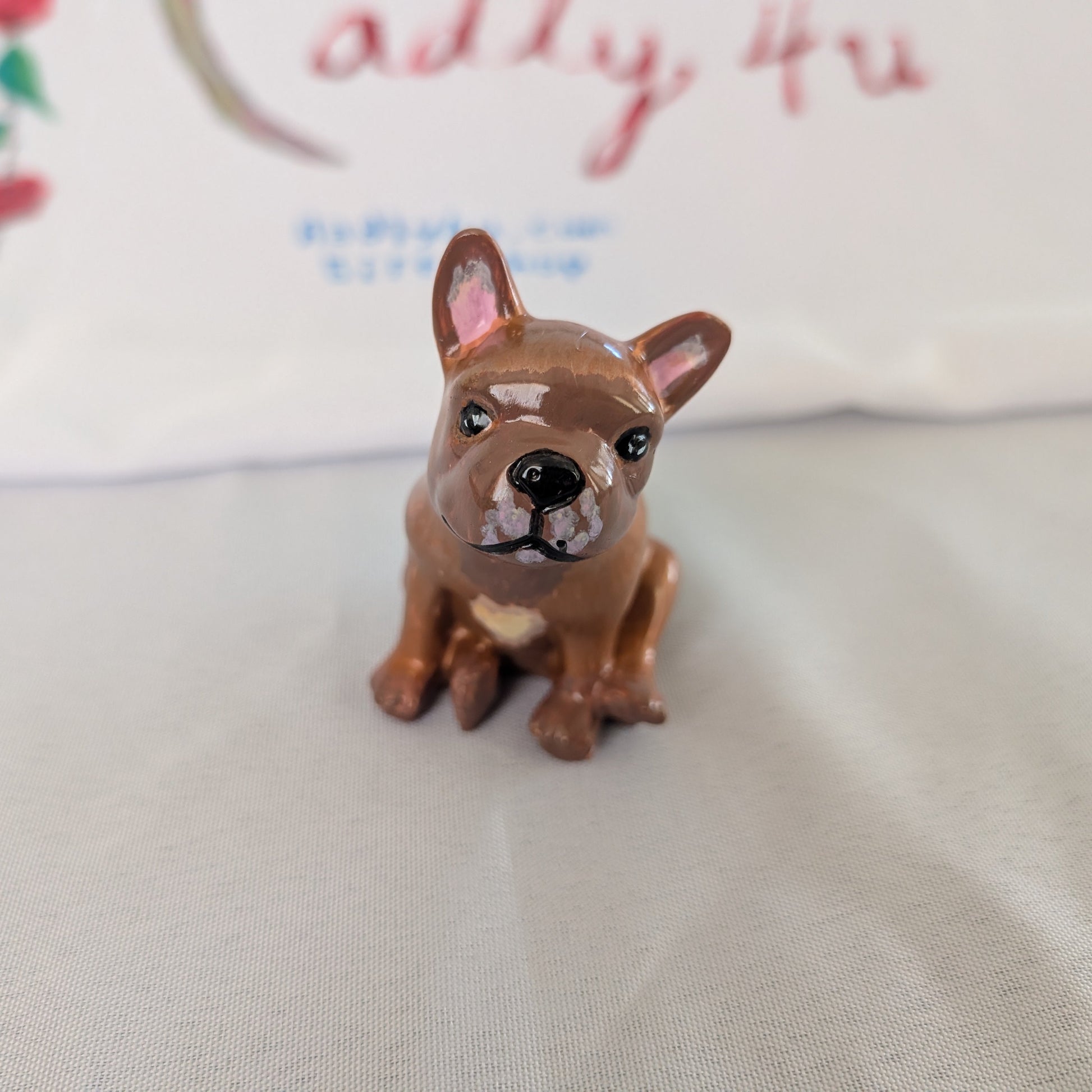 Resin frenchie dog trinket

hand crafted with eco resin, and hand painted with acrylic paints.

Eco Resin feels similar to Ceramic or porcelain: smooth, cool to the touch, and non-plastic.