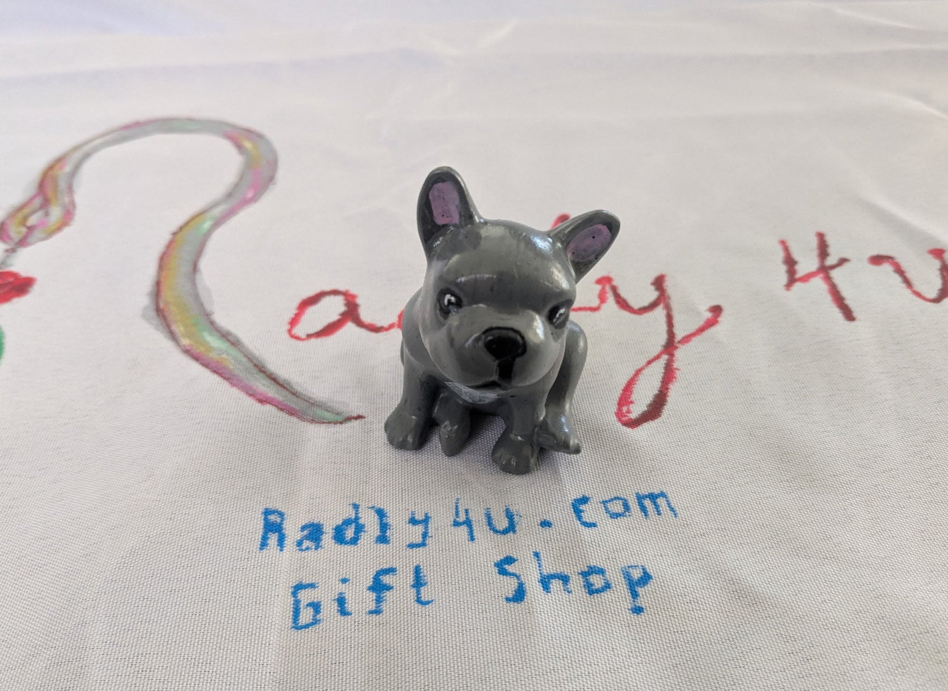 Resin frenchie dog trinket

hand crafted with eco resin, and hand painted with acrylic paints.

Eco Resin feels similar to Ceramic or porcelain: smooth, cool to the touch, and non-plastic.