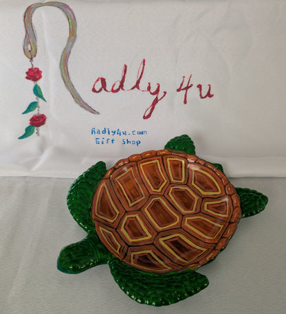 Resin Sea Turtle Tray

hand crafted with eco resin, and hand painted with acrylic paints.

Eco Resin feels similar to Ceramic or porcelain: smooth, cool to the touch, and non-plastic.